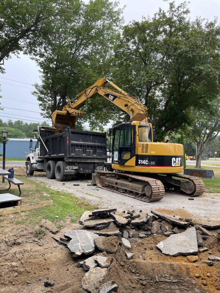 A photo of a driveway being excavated.